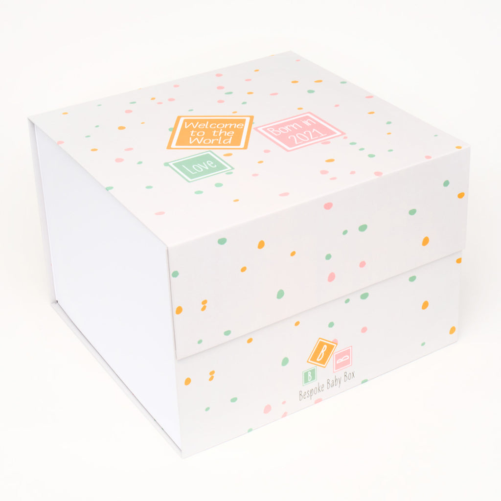 Baby keepsake memory box in neutral dotty pattern design.  that can be personalised. From Bespoke baby box