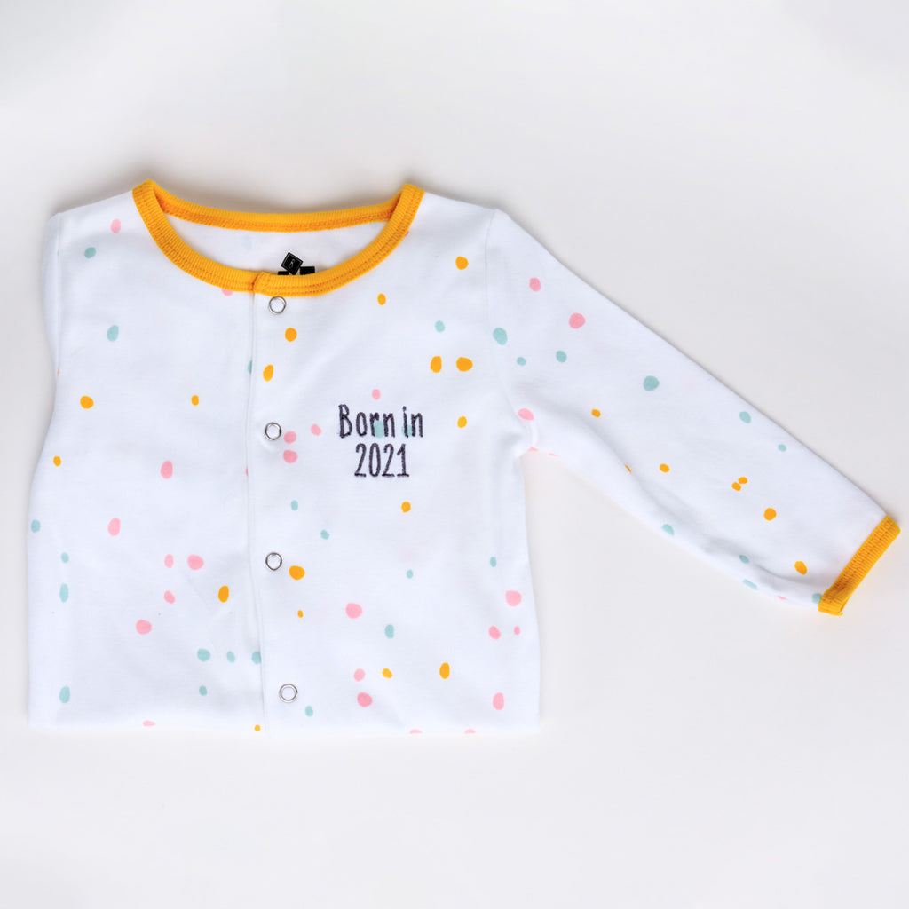 Personalised embroidered Baby grow & matching hat in neutral unisex dotty pattern design with the words, born in 2021, in grey thread