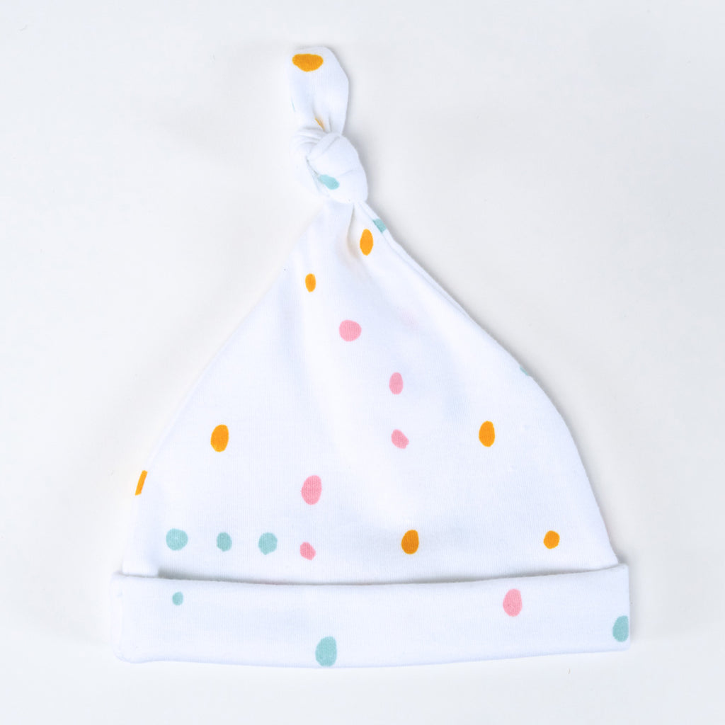 Matching baby hat with neutral dotty pattern design