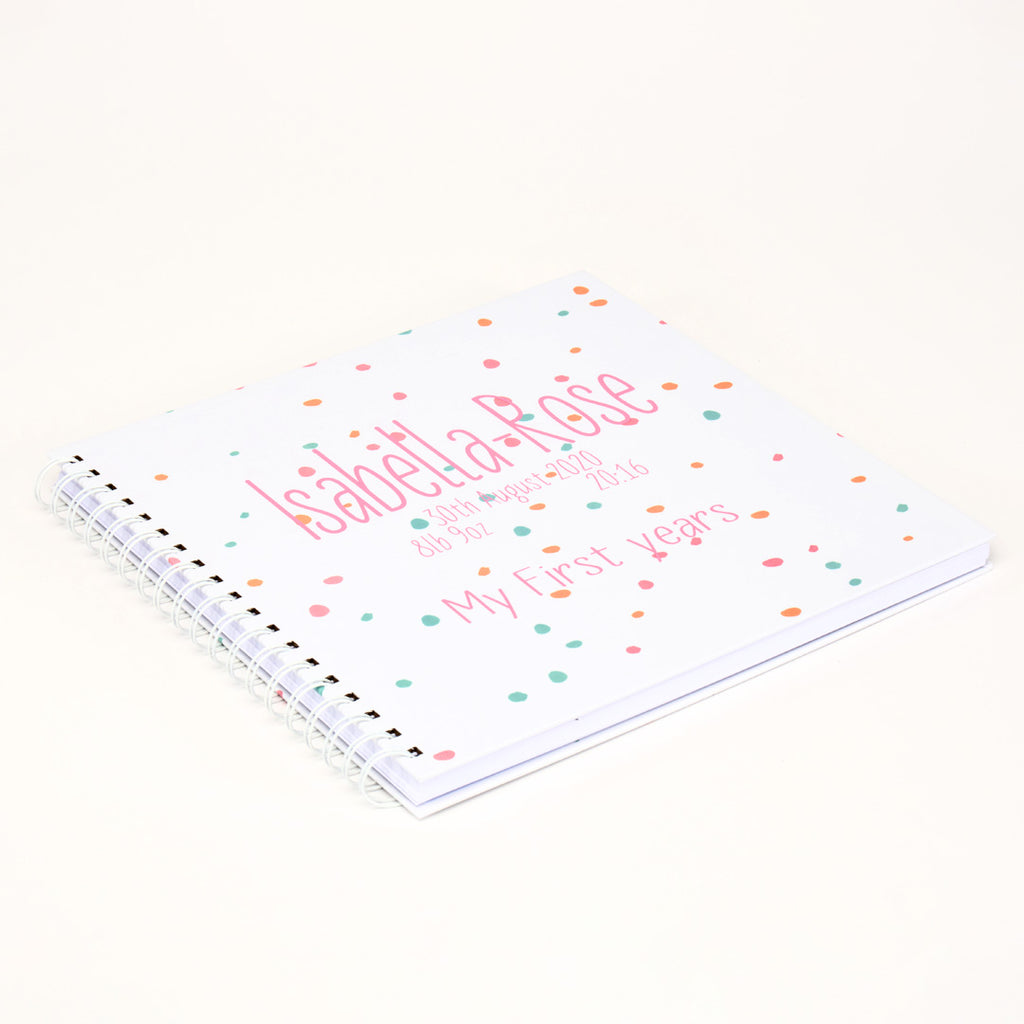 Ring-bound Memory Book that can be personalised, for example, Isabella Rose, date of birth and weight at birth in pink colour text.