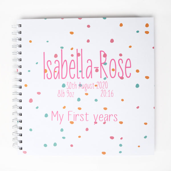 Ring-bound Memory Book that can be personalised, for example, Isabella Rose, date of birth and weight at birth in pink colour text.  