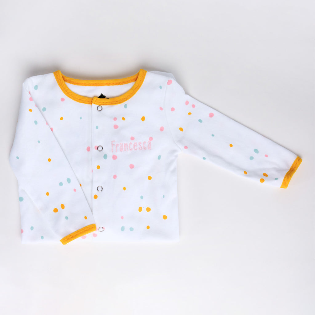 Personalised embroidered Baby grow & matching hat in neutral unisex dotty pattern design with orange trim.
