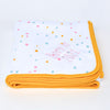 Personalised embroidered baby Blanket in neutral pastel coloured dotty pattern with a striking orange trim